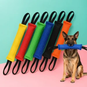 Dog bite tug toy with dual handles available in yellow, red, green, blue, black, and orange, shown with a Belgian Malinois holding the blue training tug.