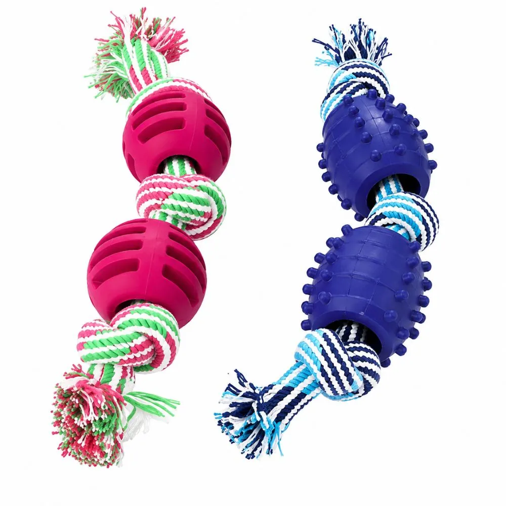 Close-up of dog rope toy with ball in magenta and navy blue, showing ridged and dotted chew ball texture with cotton rope knots