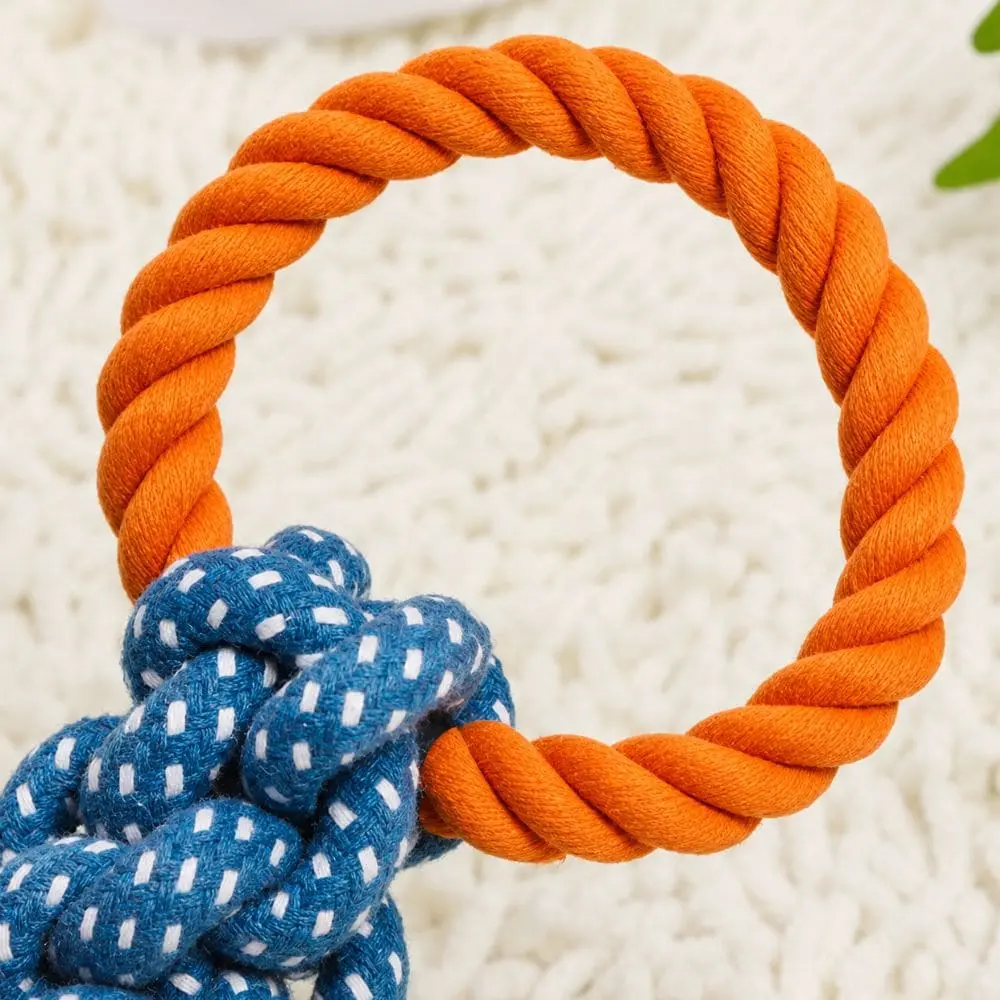 Braided rope ball detail with orange ring on dog chew toy