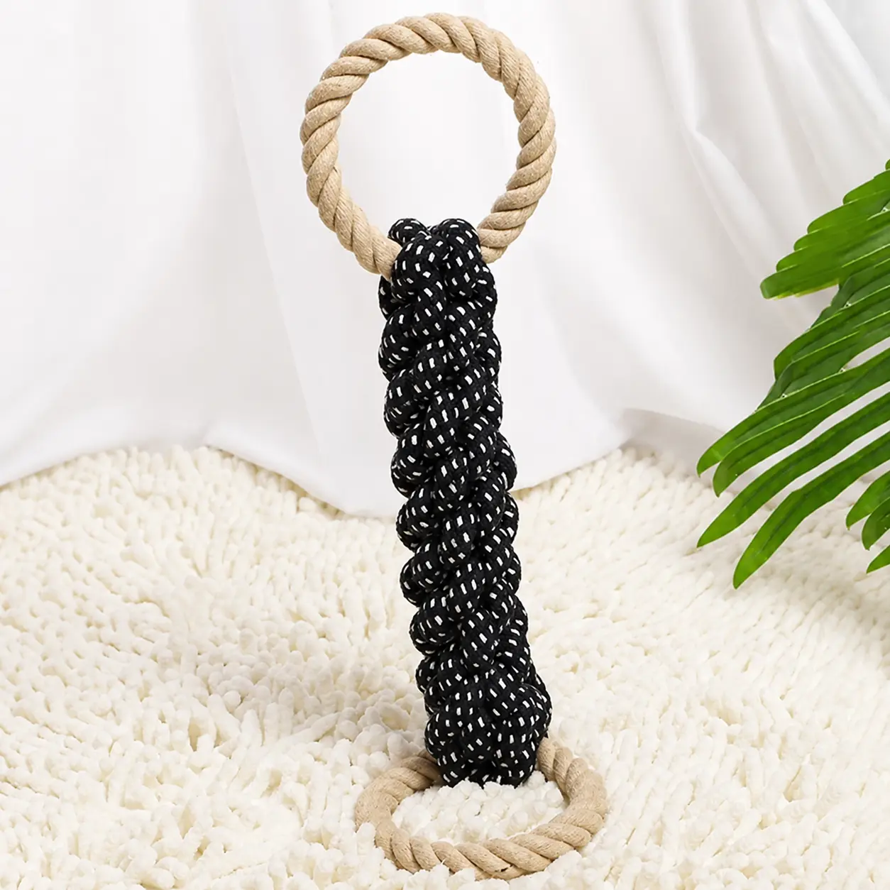 Close-up of ring handle on double ring dog rope toy