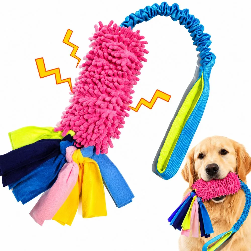 Interactive dog training tug toy with a soft chenille bite pad, bungee handle, and fleece strips for reward-based play and tug training.