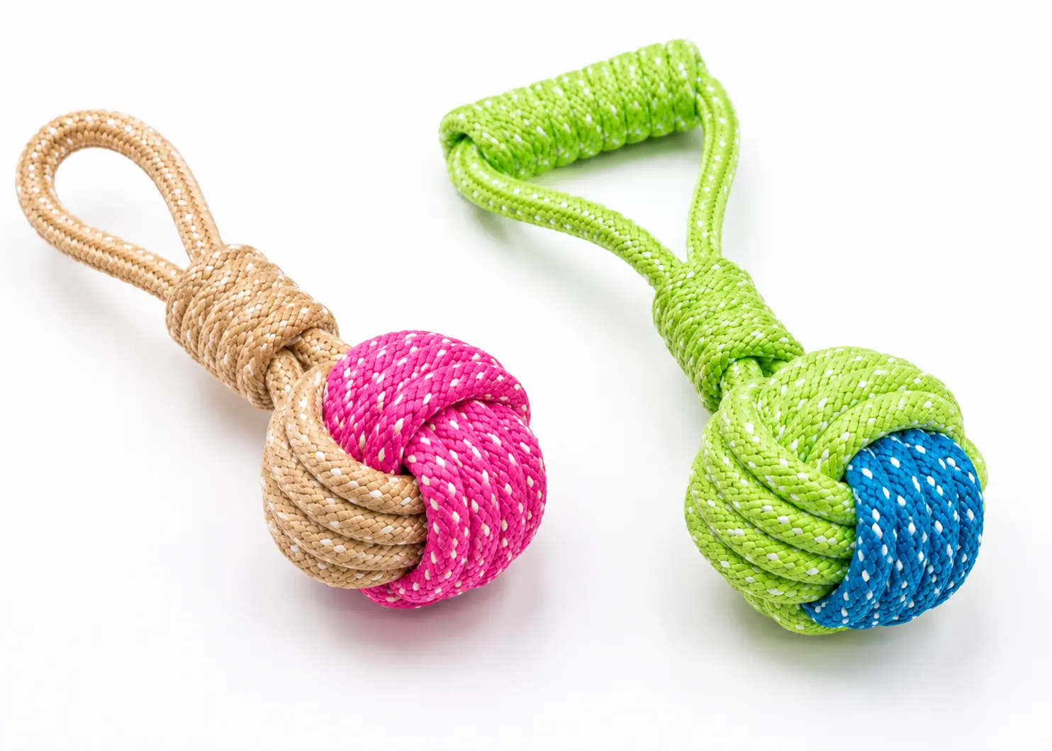 Tan-pink and green-blue rope ball dog toys with braided handle loops