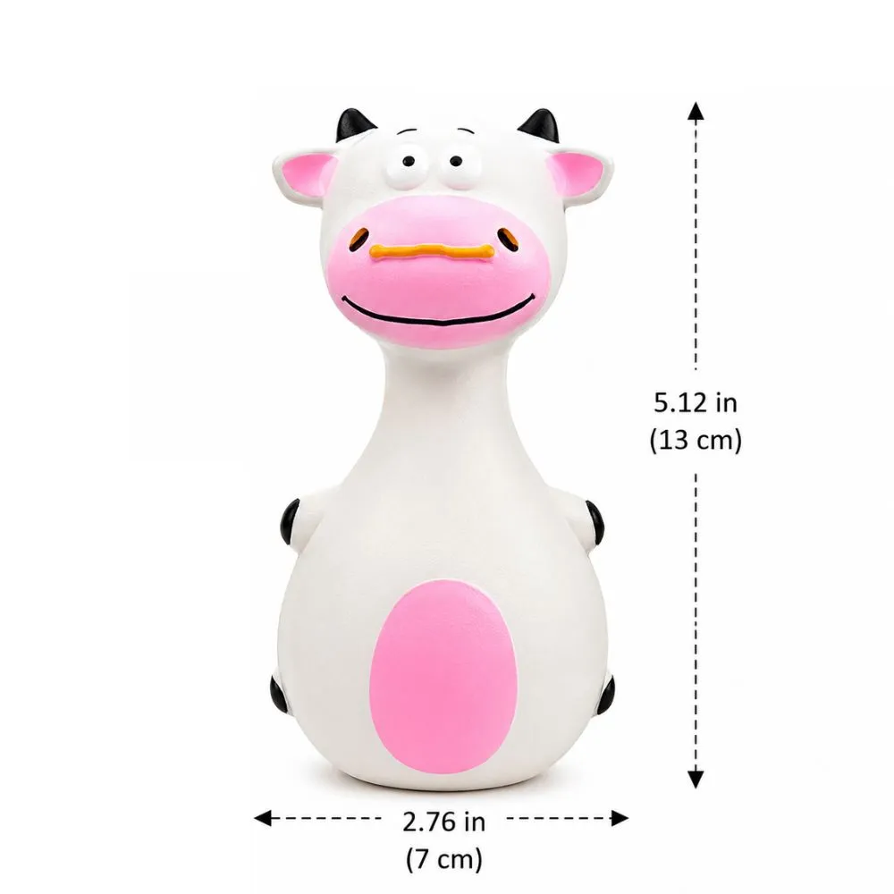 White cow shaped rubber squeaky dog toy with pink belly