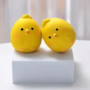 Two squeaky chicken dog toys shown together