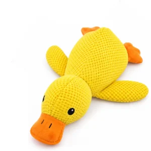 Close-up of the Calming Duck Dog Toy showing its ridged pineapple velvet texture and embroidered face