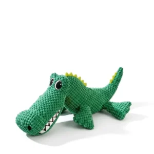 Green squeaky crocodile pet toy shown from the side on a white background